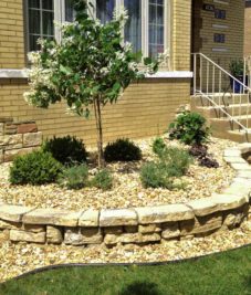 Yellow Brick House with Stone